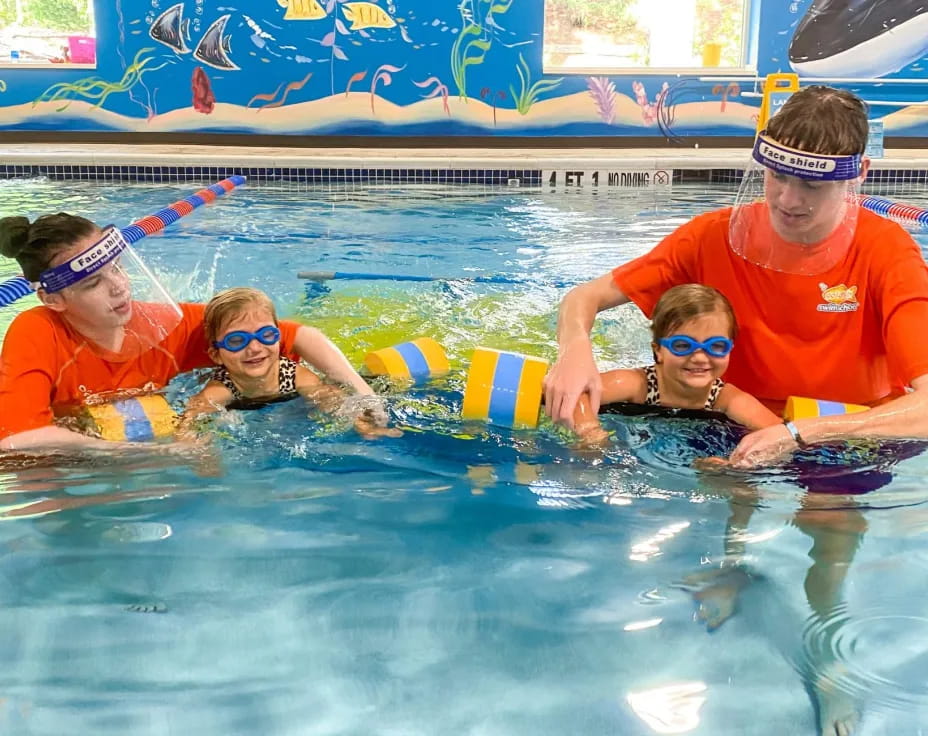 a group of people in a pool