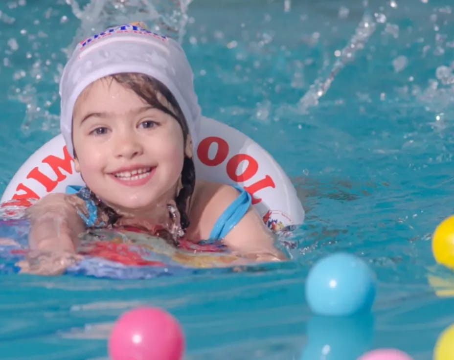 a girl in a pool