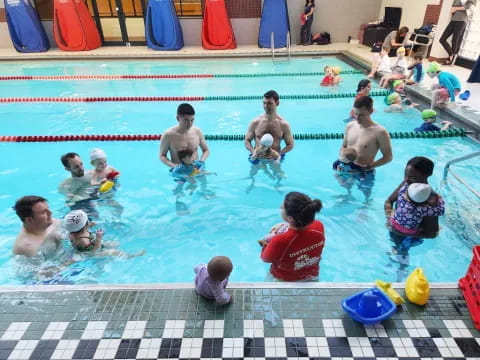 a group of people in a pool