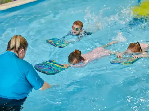a group of people in a pool