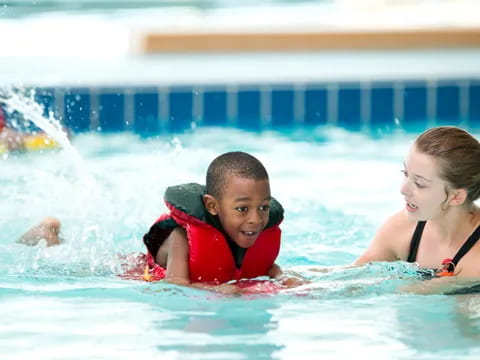 a group of people in a pool