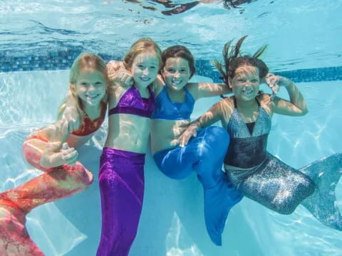 a group of people in a pool
