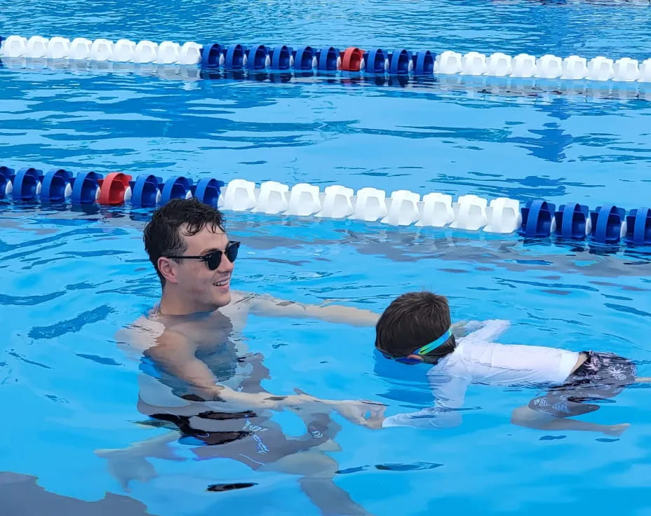 a man and a woman in a pool
