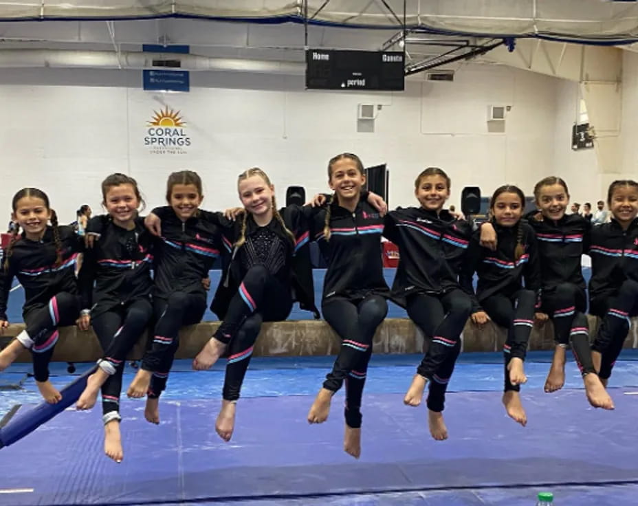 a group of girls in black uniforms