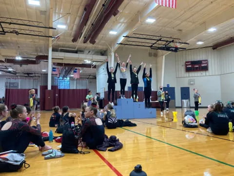 a group of people on a gym