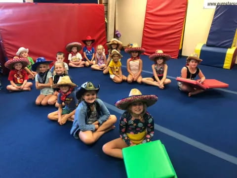 a group of children wearing hats