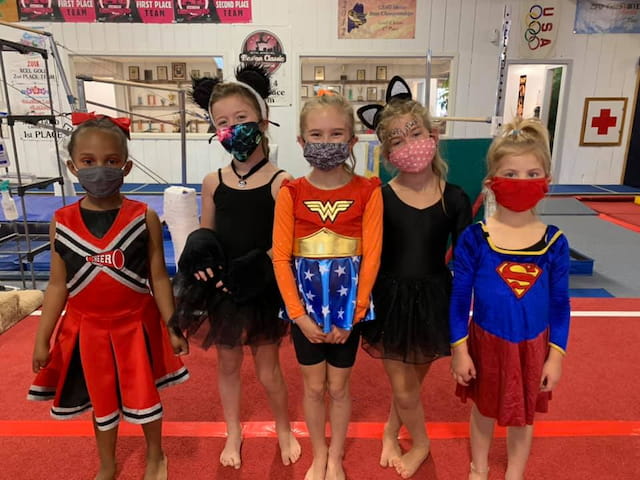 a group of children wearing clothing