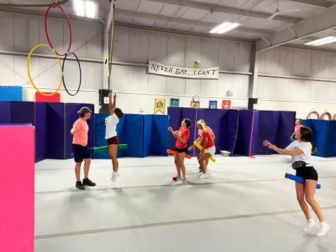 a group of women playing tennis