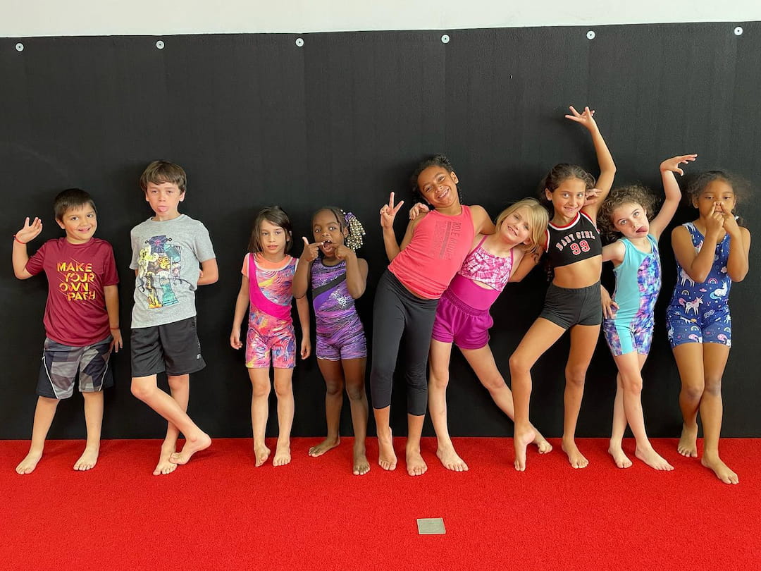 a group of children posing for a photo