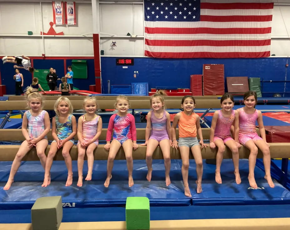a group of girls in a swimming pool