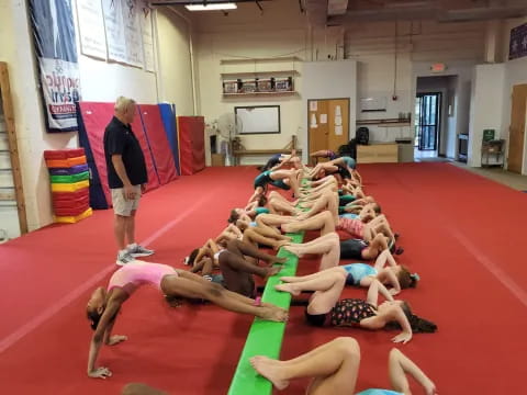 a group of people in a gym