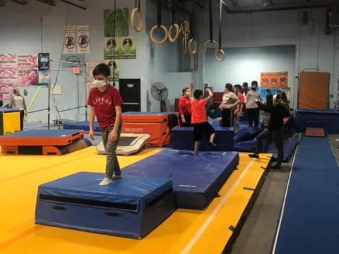 a group of people in a gym