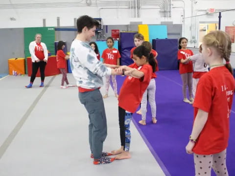 a group of people in a gym