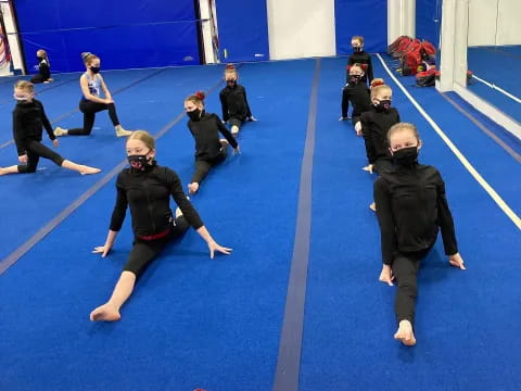 a group of people in a gym