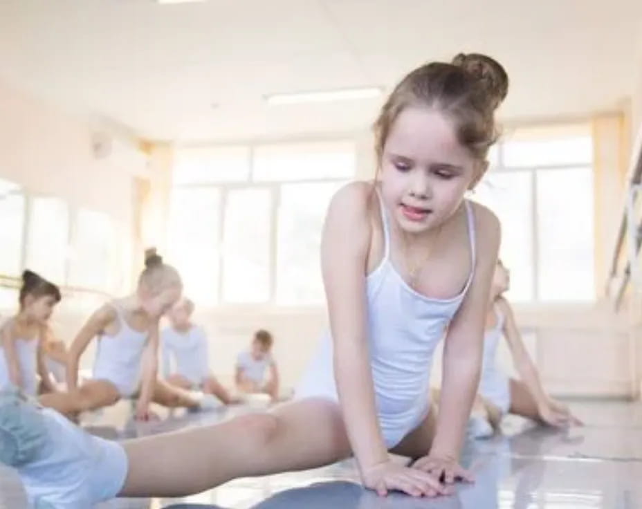 a woman doing yoga in a room
