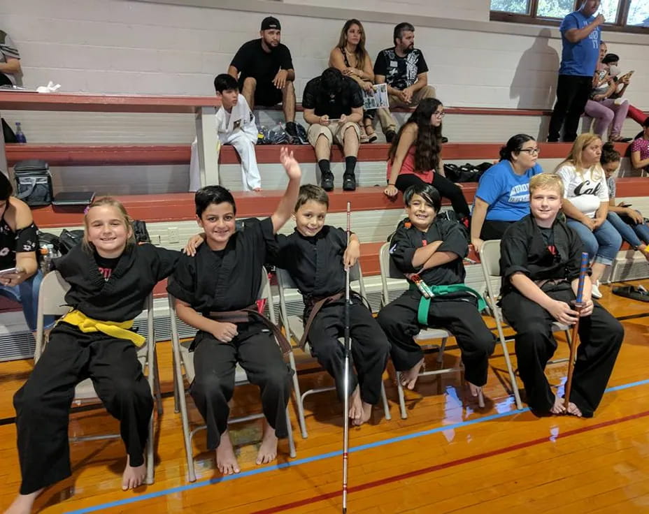 a group of people sitting in chairs