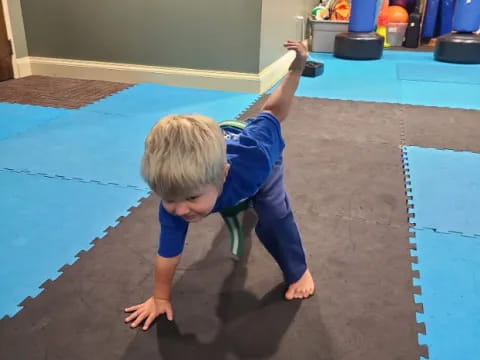 a child crawling on the floor