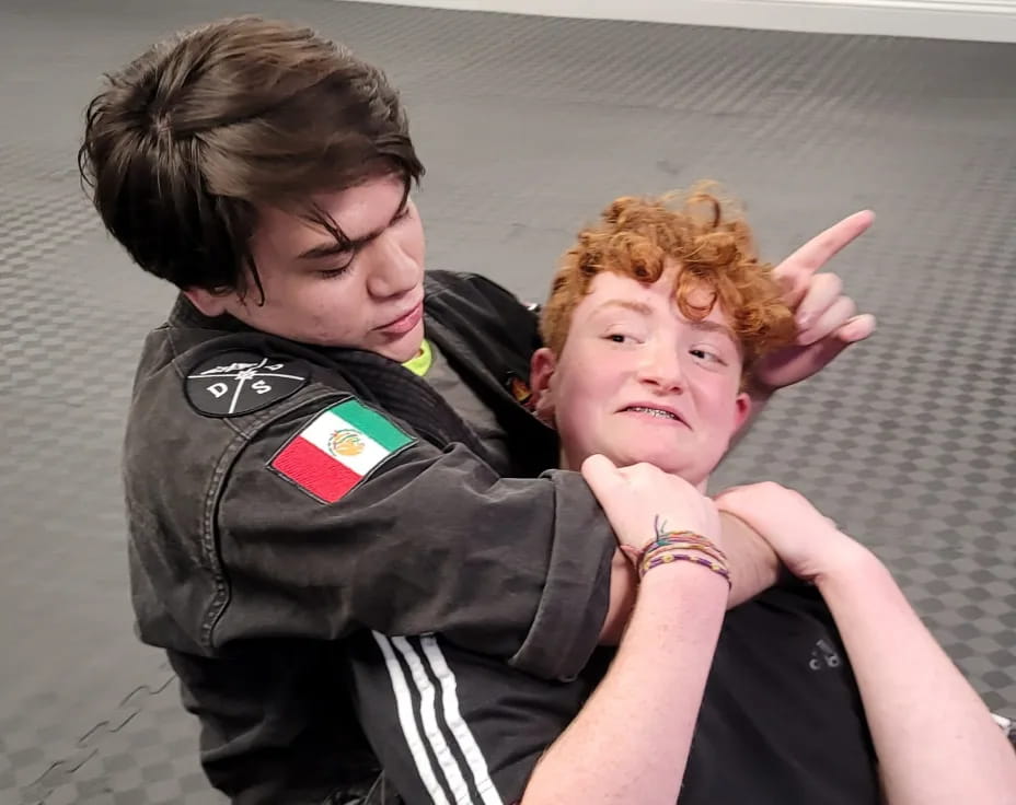 a person holding a child