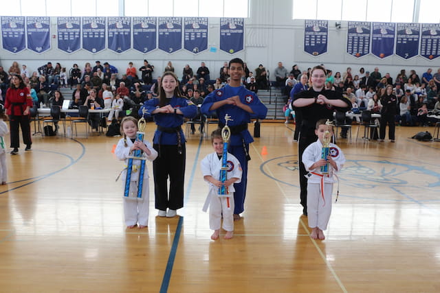 a group of people in a gym