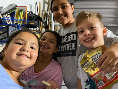 a group of kids smiling