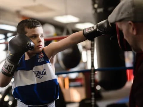 a man wearing boxing gloves