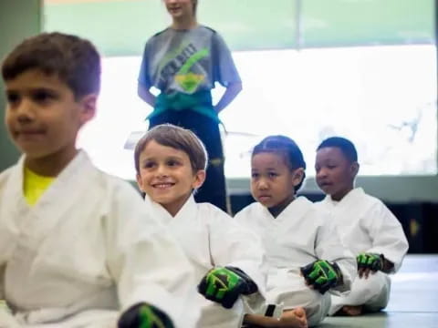 a group of people in white shirts