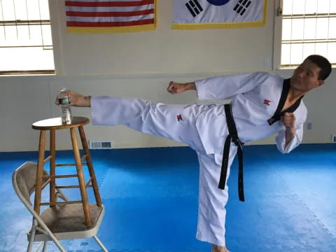 a man in a karate uniform