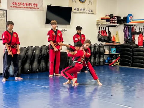 a group of people in a gym
