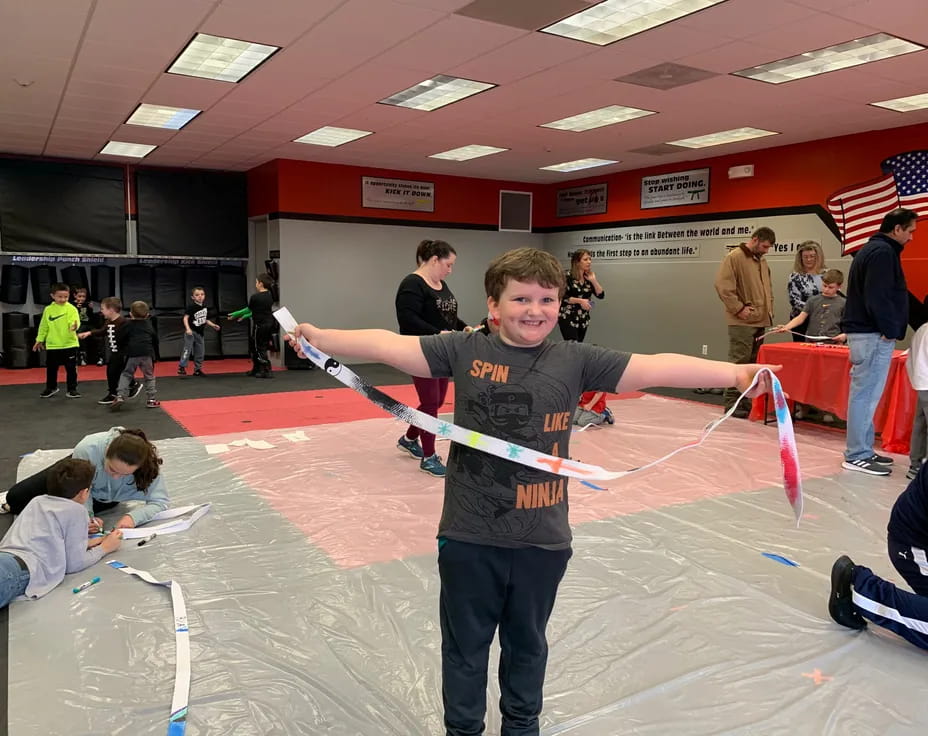 a boy holding a sword