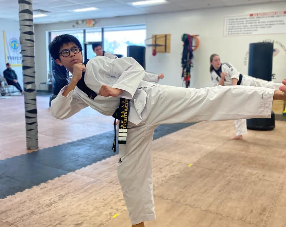 a man in a karate uniform