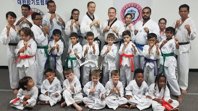a group of people posing for a photo
