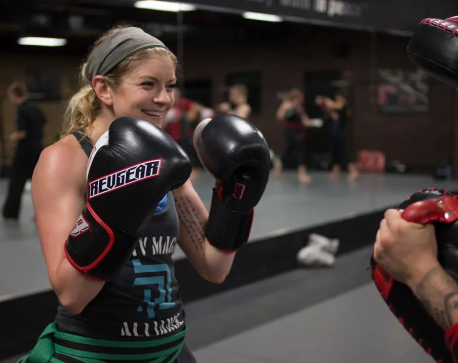 a person wearing boxing gloves