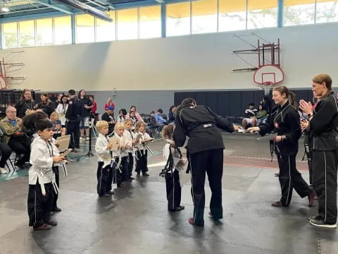 a group of people in a hall
