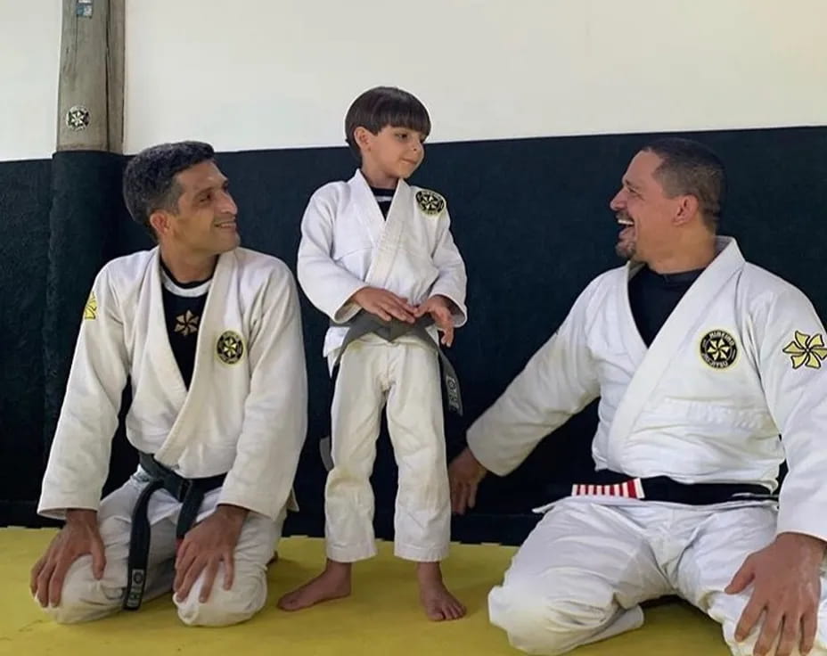 a group of men in karate uniforms