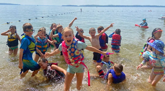 a group of people in the water