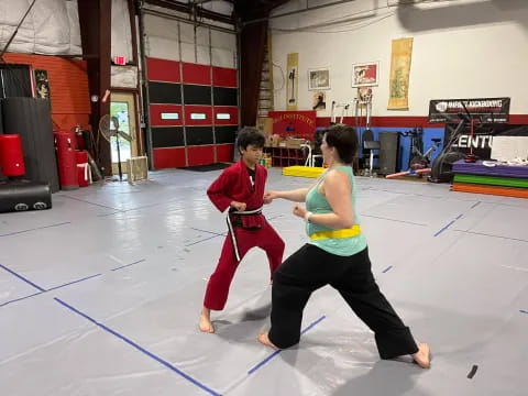 a man and a woman in a gym