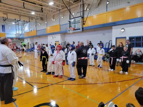 a group of people in a gym