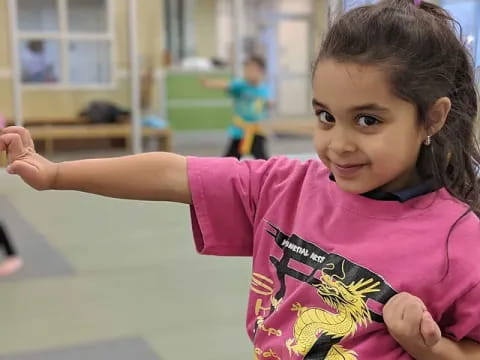 a girl with her arms out