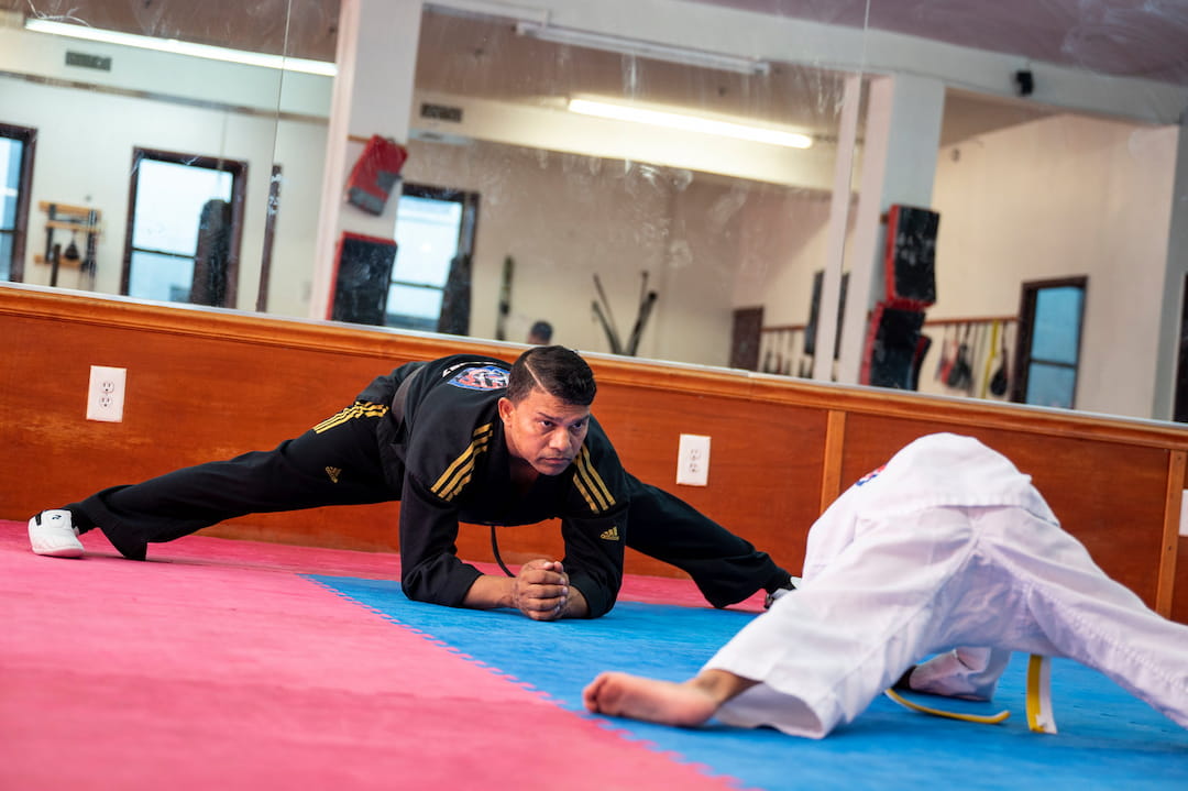 a person doing a plank on a mat