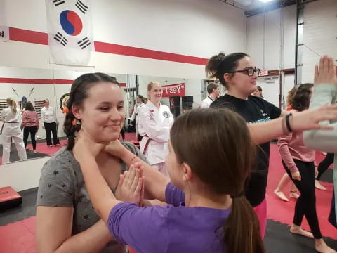 a person holding a girl