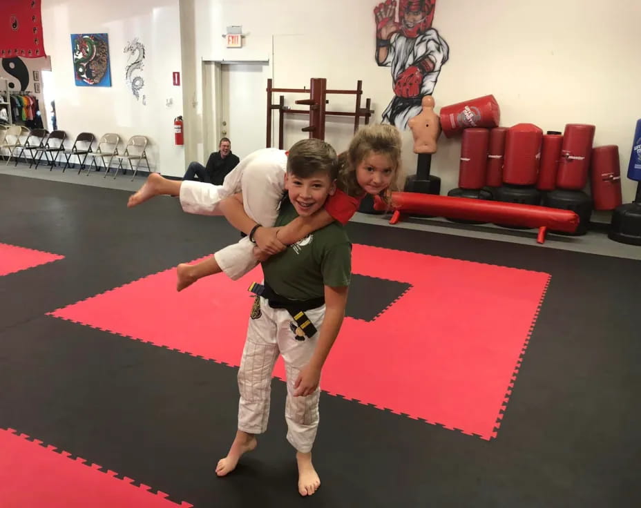a boy and girl dancing