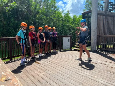 a group of people wearing helmets