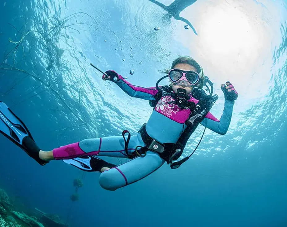 a person in scuba gear underwater