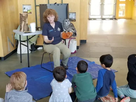 a person teaching children