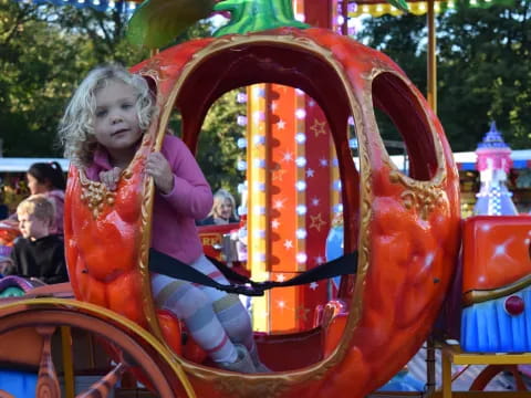 a girl riding a ride