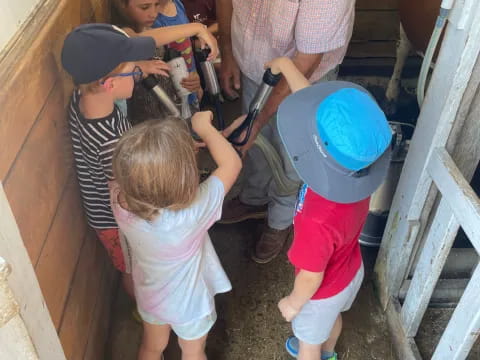 a person and a group of children
