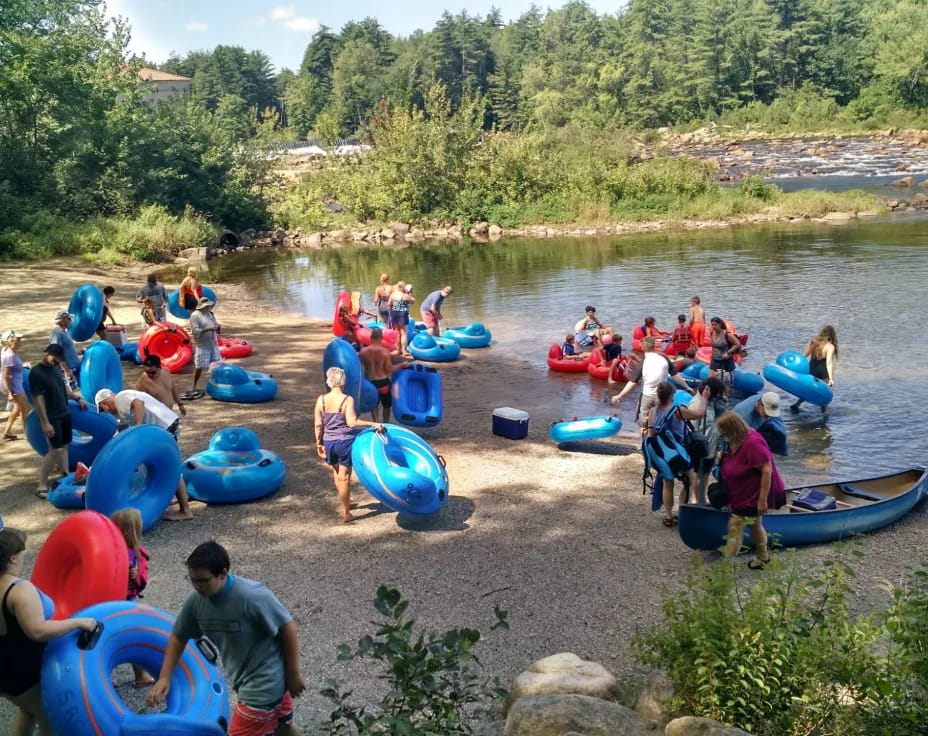 a group of people in a river