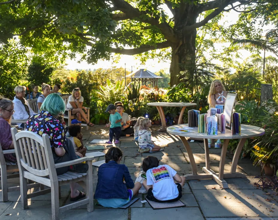 a group of people sitting on a deck