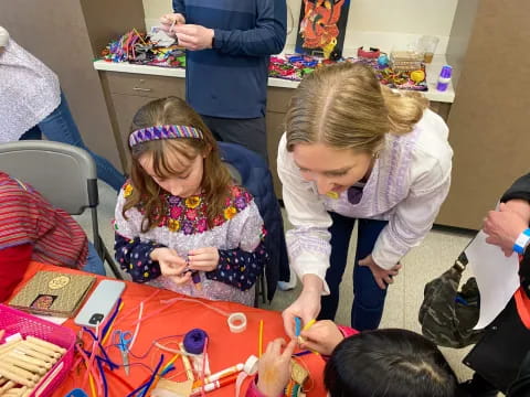 a group of children painting