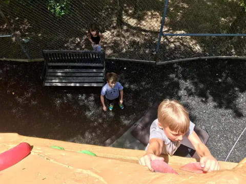 kids playing in a sand pit